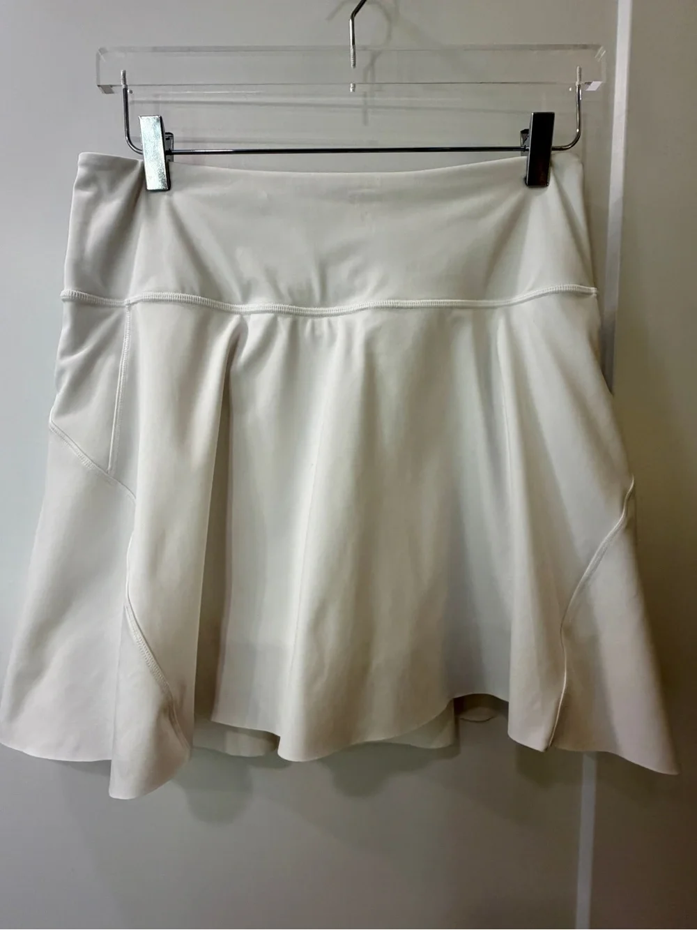 Athleta White Mini Skirt with Slight Flare, pockets on each side.